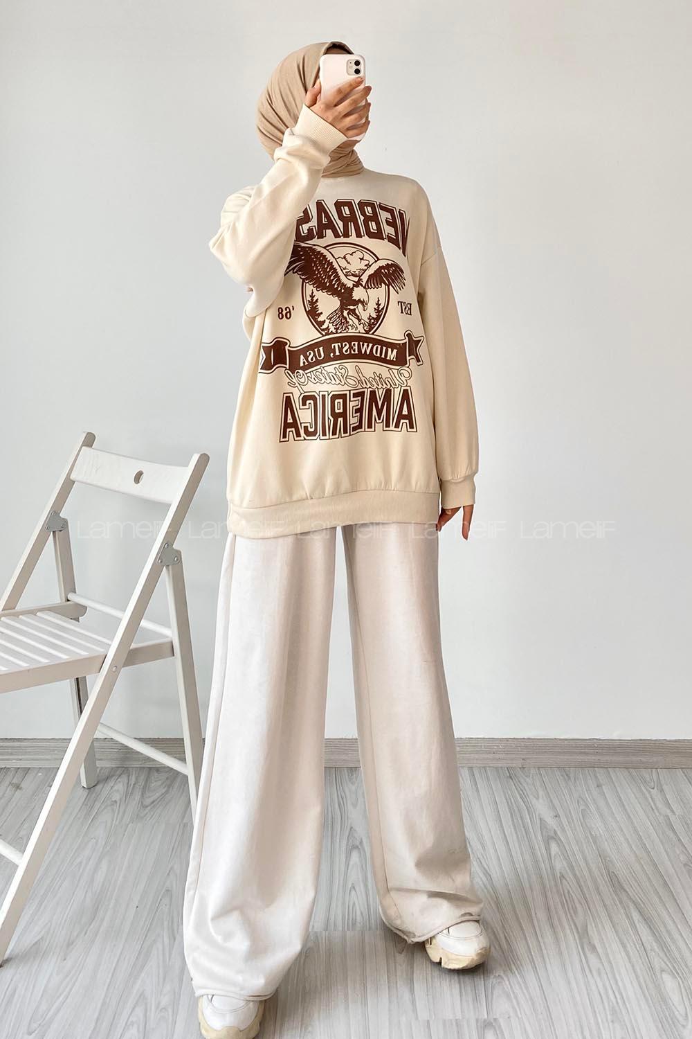 Modalamelif  Bisiklet Yaka Nebraska Baskılı Sweat Krem